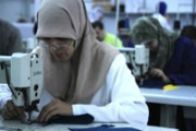 Textilarbeiterin in Marokko Foto: (c) Sdwind